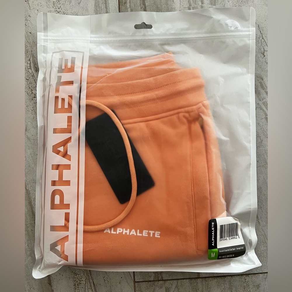 Alphalete Women’s Essential Short in Orange Frost